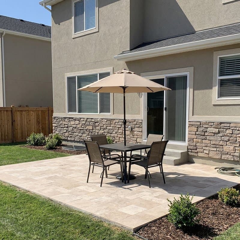 Travertine patio install in Lehi